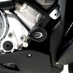 Detalle bobbin blanco R&G en M1000XR 2024 mostrando forma aerodinámica y acabado premium