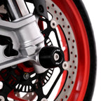 Protector Horquilla R&G APEX vista frontal en Aprilia Tuono 660 protegiendo barras suspension y caliper freno