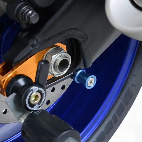 Detalle brazos ajustables caballete R&G Elevation con ganchos para basculante moto