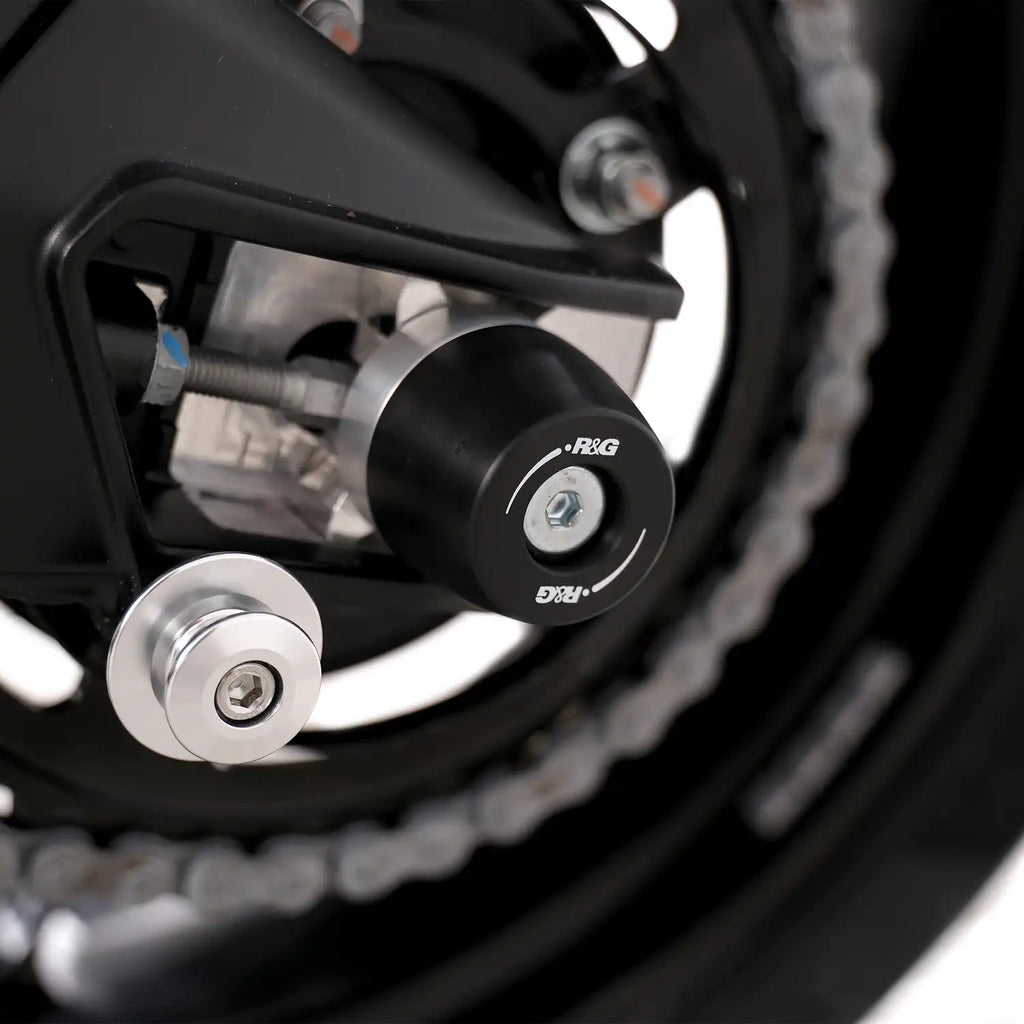 Barra de acero inoxidable pasante eje trasero con bobbins APEX Aprilia RS660