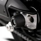 Detalle bobbin cónico APEX negro HDPE en basculante Aprilia RS660 2025
