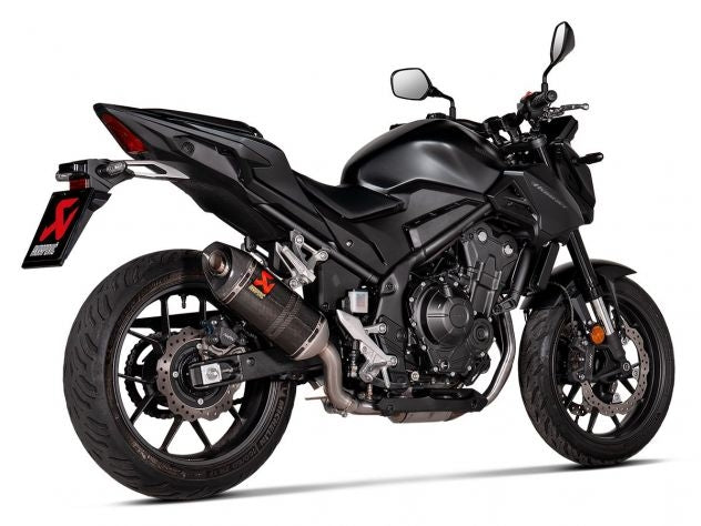 Terminal Akrapovic carbono para Honda NX 500 vista lateral detalle tapa
