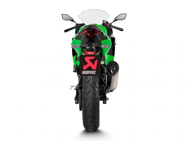 Comparativa peso escape original vs Akrapovic titanio Kawasaki Ninja 500 reducción 1.3 kg