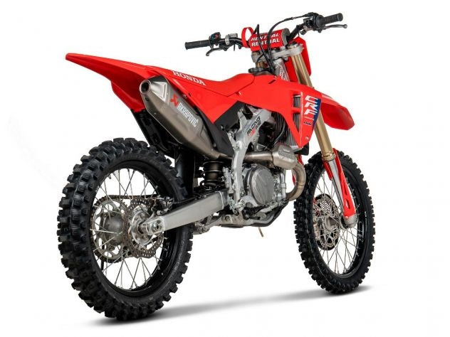 Detalle escudo térmico multicapa y abrazadera escape Akrapovic CRF 450 R