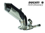 Detalle construcción titanio y carbono escape Akrapovic Multistrada V4 Rally