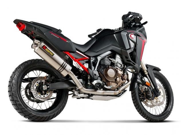 Detalle silenciador hexagonal doble flujo Akrapovic con funda titanio y abrazadera carbono