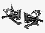 Estriberas traseras ajustables Bonamici Racing para Kawasaki ZX-4R RR 2023-2024 anodizado negro