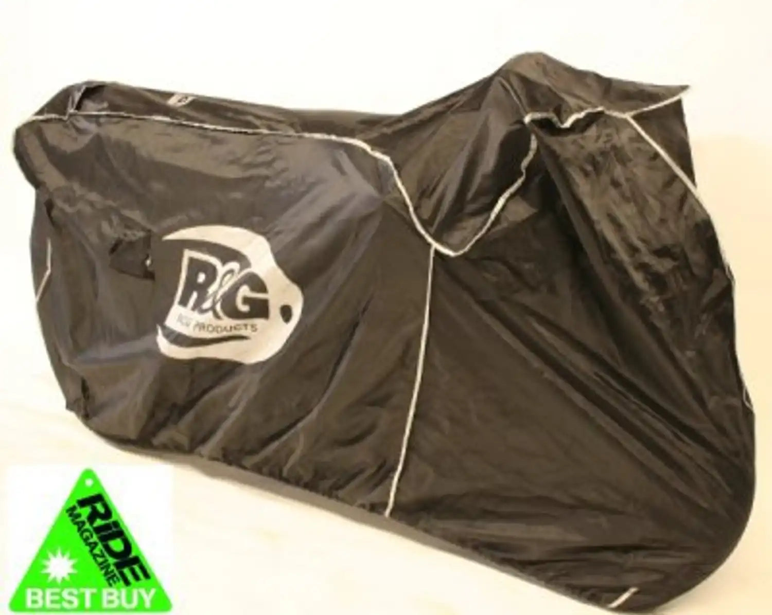 Cobertor Outdoor R&G Superbike negro desplegado sobre moto deportiva con logos reflectantes visibles