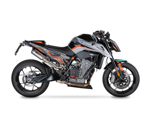 Detalle bocinas CNC mecanizadas 5 ejes sistema escape Dyno Spark titanio KTM Duke 790 L