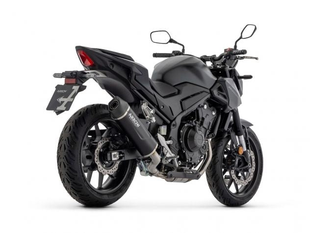 Vista lateral escape Arrow Indy Race EVO estructura acero inoxidable Honda CB 500 Hornet