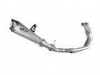 Escape completo Spark Konix Evo titanio montado en Yamaha R7 con fondo de fibra de carbono
